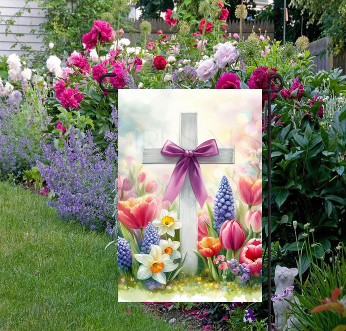 A beautiful Easter Cross surrounded by bright Spring flowers.