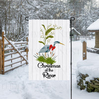 This flag featuring a Christmas at the River Blue Heron will be perfect for your Nautical Decor