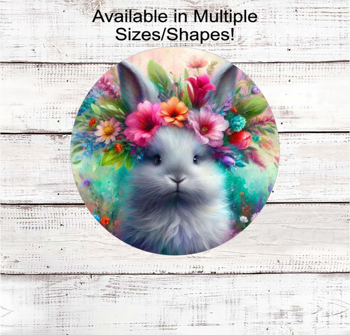 A beautiful fluffy grey Bunny Rabbit surrounded by bright Spring flowers.