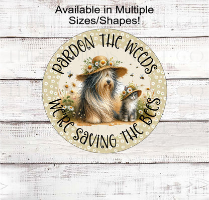 Parden the Weeds-We&#39;re Saving the Bees! This adorable dog and cat are sitting in the daisies and dandelions with honeybees flying around.