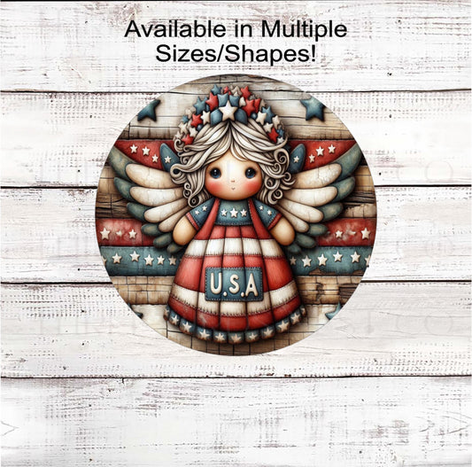 An adorable Patriotic Angel with USA on her dress.