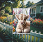 An adorable baby Higland Cow 
surrounded by Spring flowers.