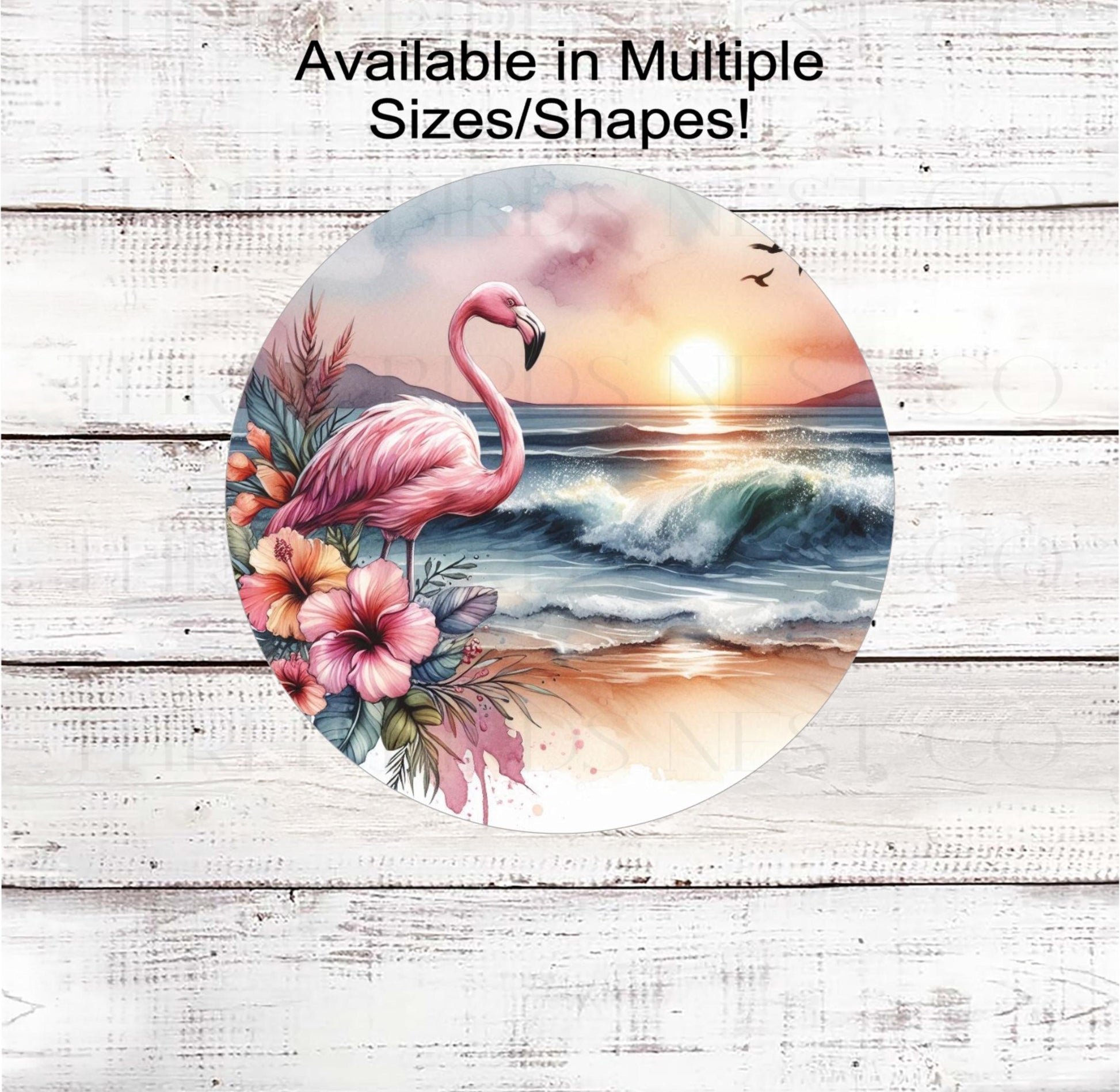 A beautiful pink Flamingo surrounded by Hibiscus flowers at sunset at the Beach.
