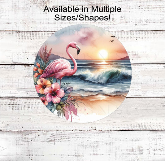 A beautiful pink Flamingo surrounded by Hibiscus flowers at sunset at the Beach.