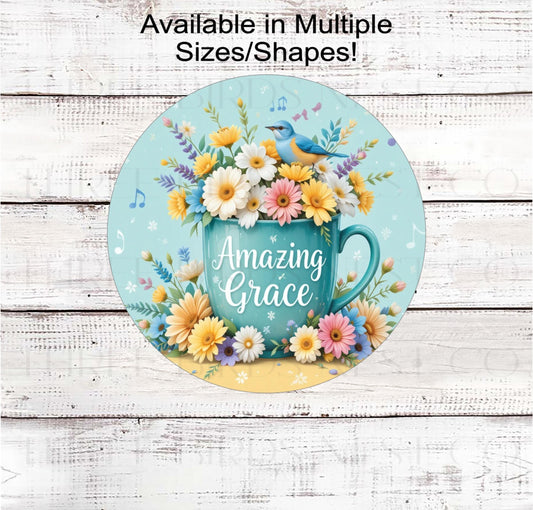 A beautiful coffee mug of flowers with a bird singing Amazing Grace.