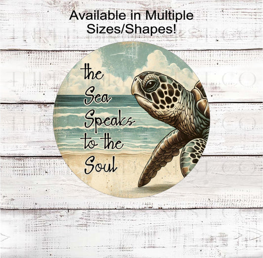 A beautiful Beach Wreath Sign featuring a Sea Turtle/ The Sea Speaksto the Soul.