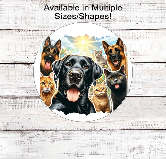 An adorable Labrador Retriever taking a selfie with his dog and cat friends