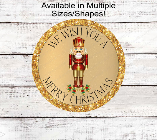 We Wish You a Merry Christmas Gold Holly Nutcracker Sign