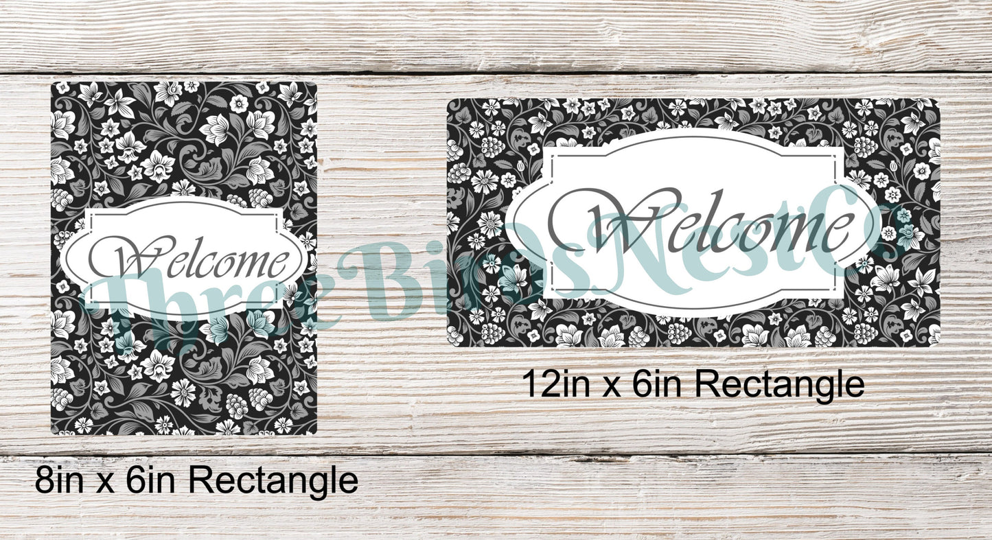 Black and Gray Floral Welcome Sign