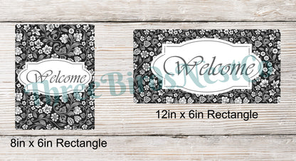 Black and Gray Floral Welcome Sign