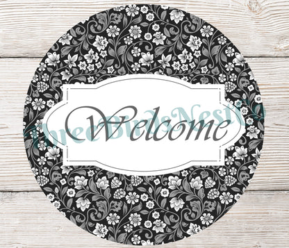 Black and Gray Floral Welcome Sign