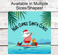 
              Christmas Wreath Signs - Here Comes Santa Claus Sign - Beach Christmas Signs - Christmas at the Beach - Paddle Board Sign
            