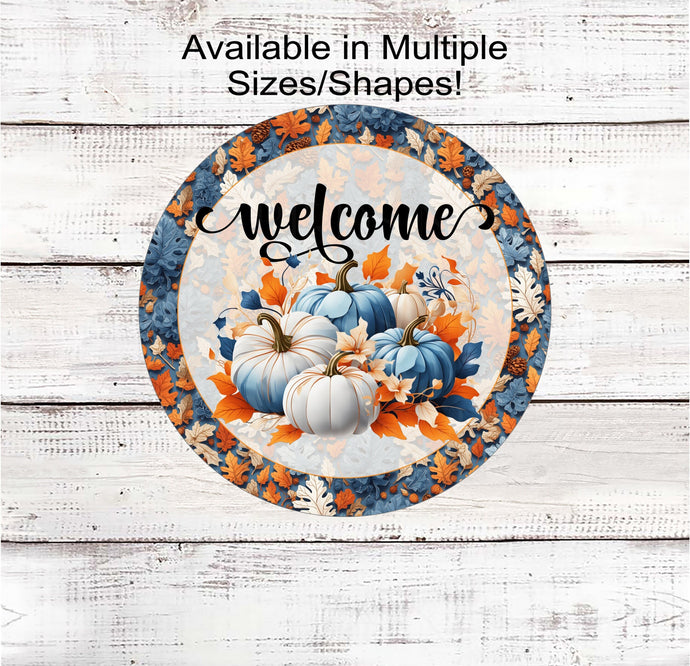 A beautiful vividly colored Welcome sign with blue, orange and white pumpkins and leaves.