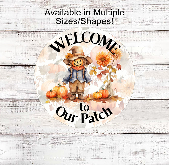 An adorable Scarecrow surrounded by sunflowers and pumpkins