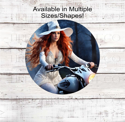A beautiful red-haired witch riding a white motorcycle
