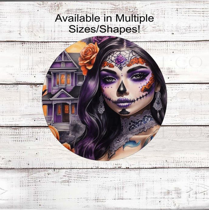 A beautiful La Catrina Sugar Skull Woman with a Haunted House in the background in purple and orange tones