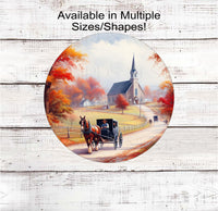
              A metal sign with an Amish Man driving a horse and buggy down a country road in the Fall with a Church in the background
            