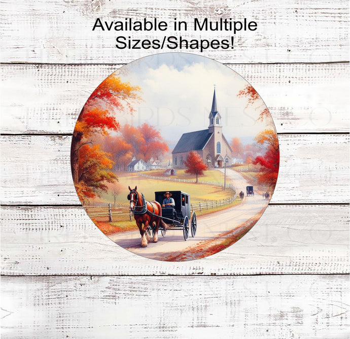 A metal sign with an Amish Man driving a horse and buggy down a country road in the Fall with a Church in the background