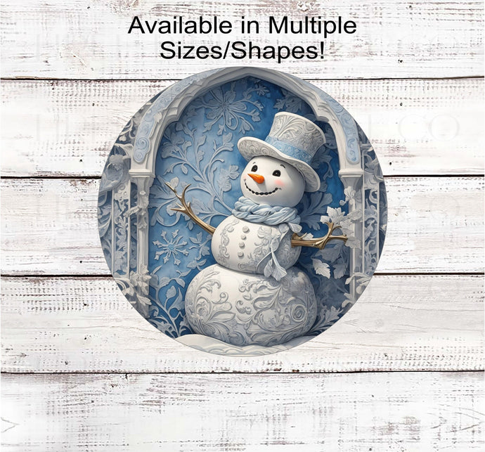 A winter Snowman in light blue and white with fancy scrolls and snowflakes