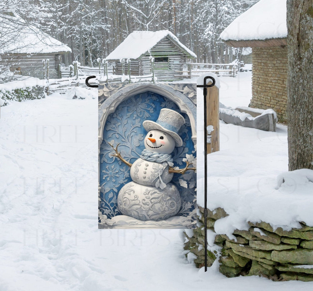 An adorable Snowman Garden Flag in pale blue and white