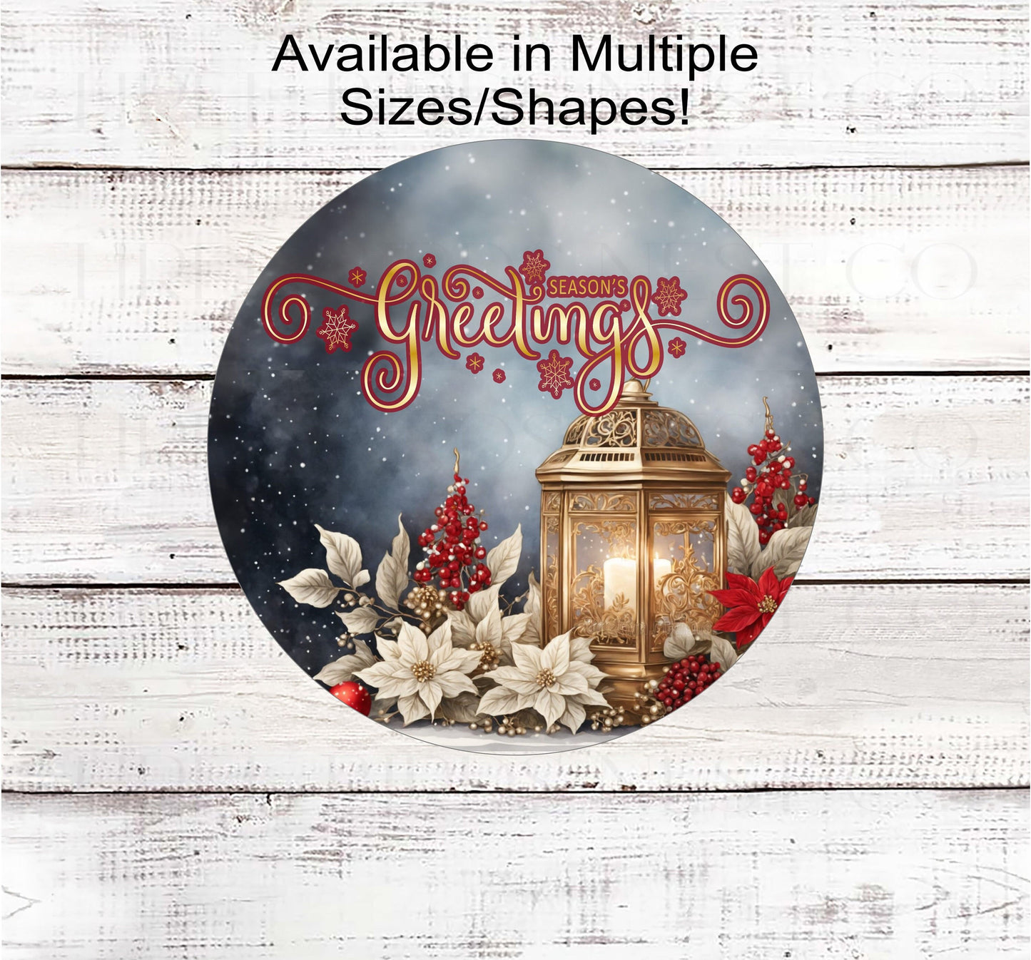 A Season&#39;s Greetings sign with poinsettias and a fancy gold lantern