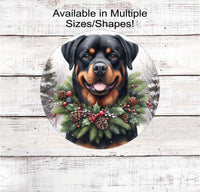 
              A Rottweiler Dog in a Winter Wonderland setting wearing a festive collar of greenery, berries and pine cones.
            