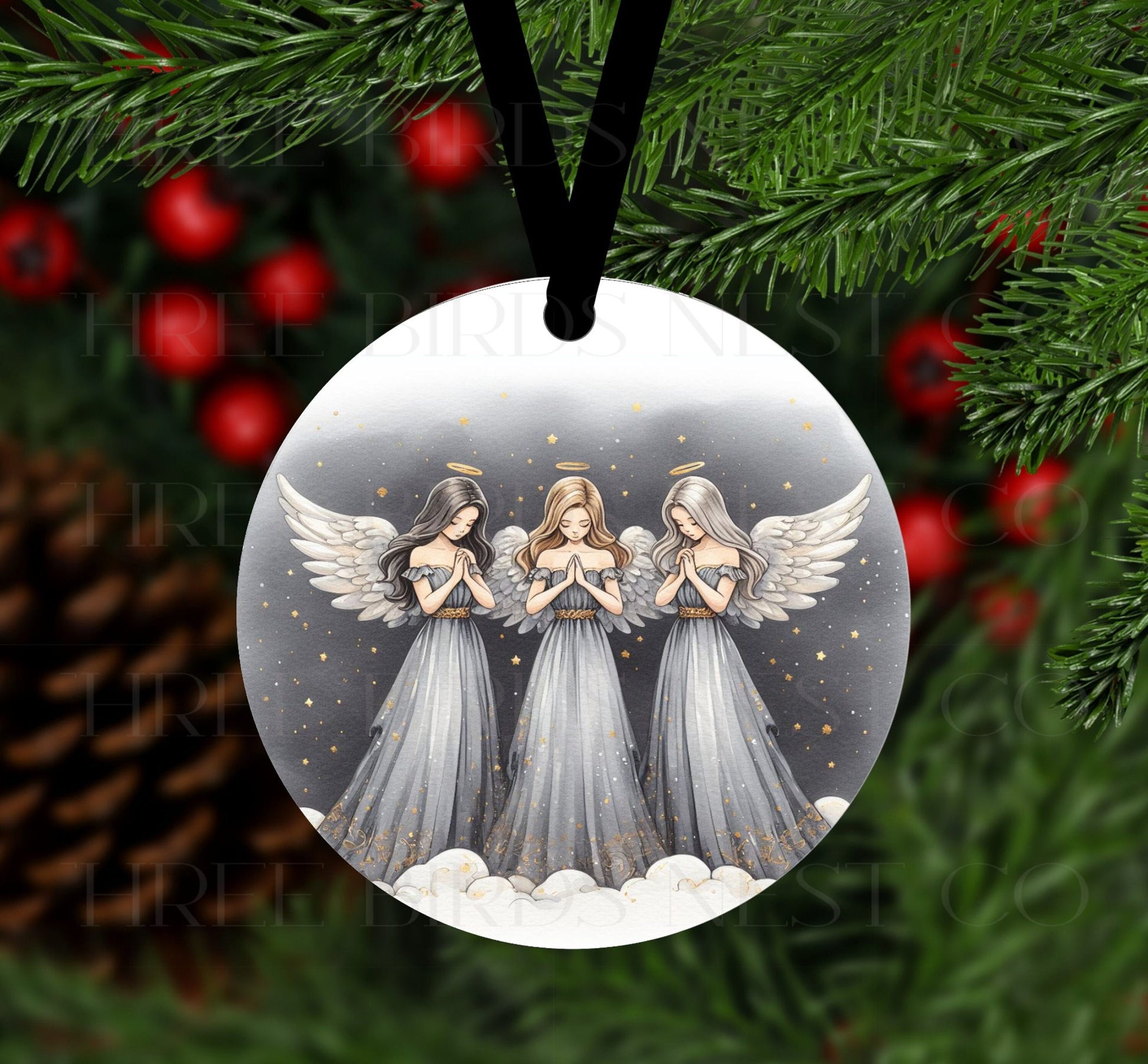 A trio of beautiful Christmas Angels with their hands together in prayer.