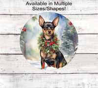 
              A Miniature Pinscher dog in a festive collar sitting in a Winter Wonderland.
            