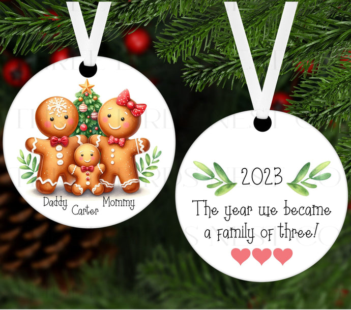 An adorable Christmas Ornament with a Gingerbread Family and Christmas Tree.