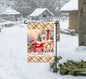 An adorable trio of Golden Retrievers next to a Christmas mailbox that&#39;s marked Letters to Santa.