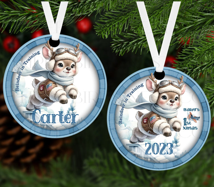 An adorable Christmas Ornament with a watercolor Reindeer boy in blue.