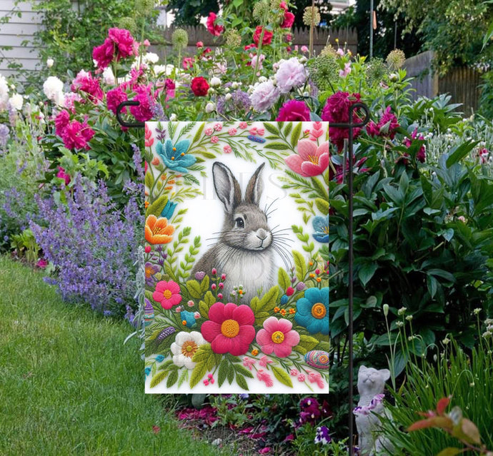 An adorable grey Easter Bunny surrounded by faux embroidered Spring Flowers.