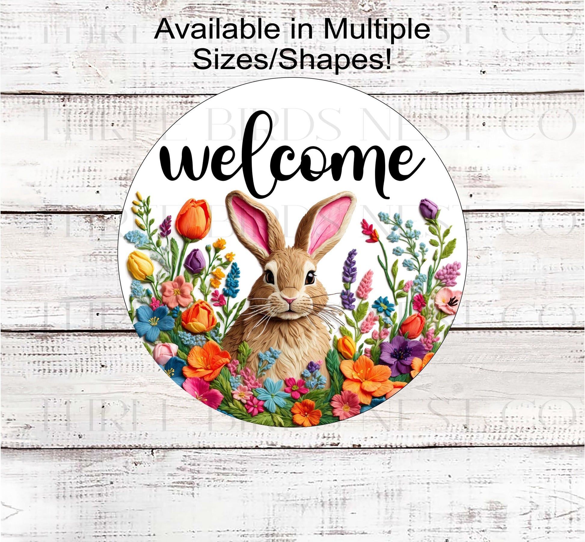 A tan Bunny Rabbit in the middle of a frame made of faux embroidered Spring flowers.