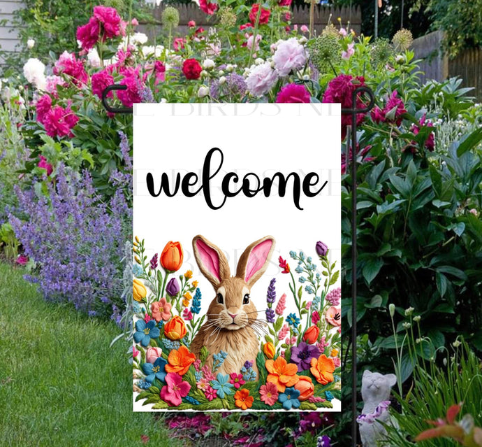 An adorable Easter Bunny Welcome with faux embroidered Spring flowers.