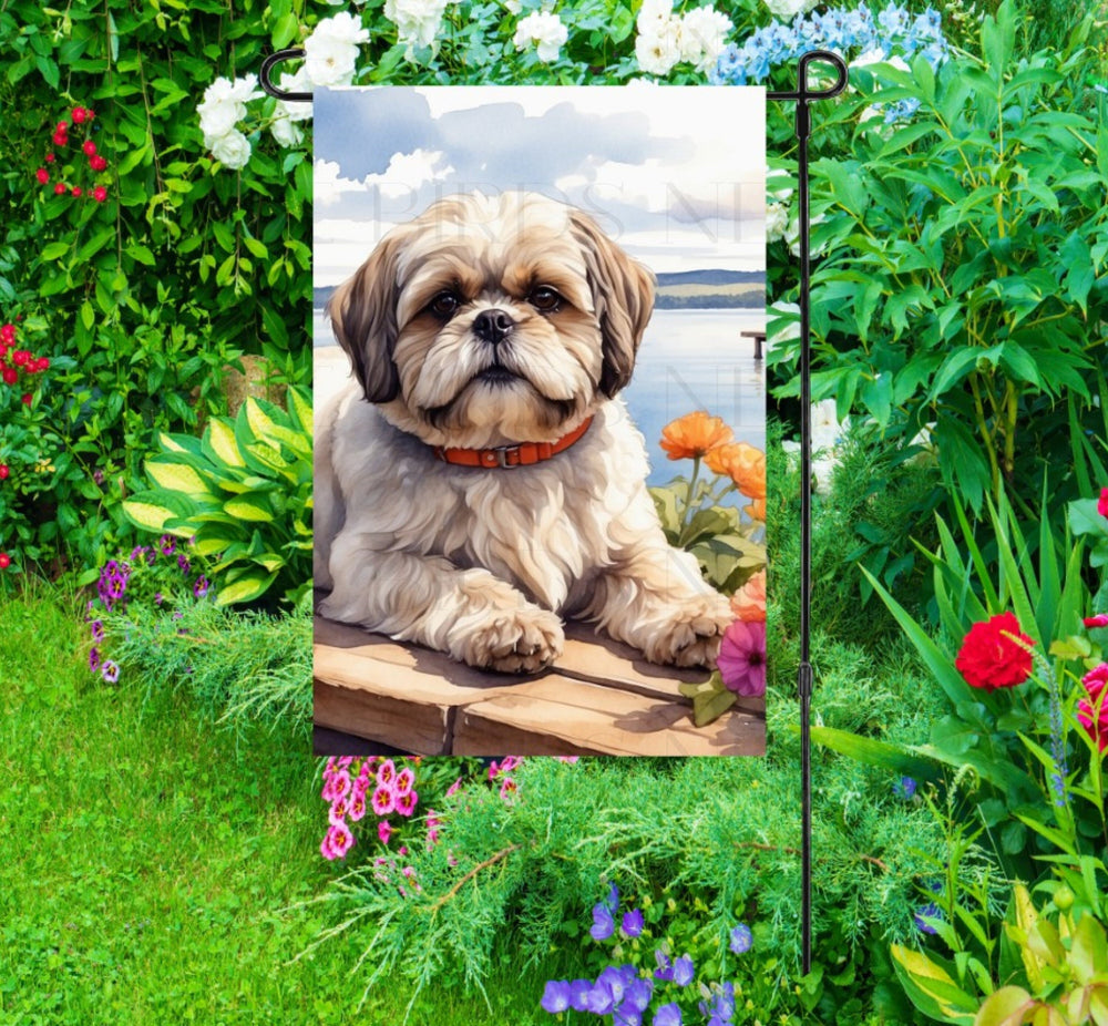 A beautiful Shih Tzu dog on a dock overlooking a Lake.