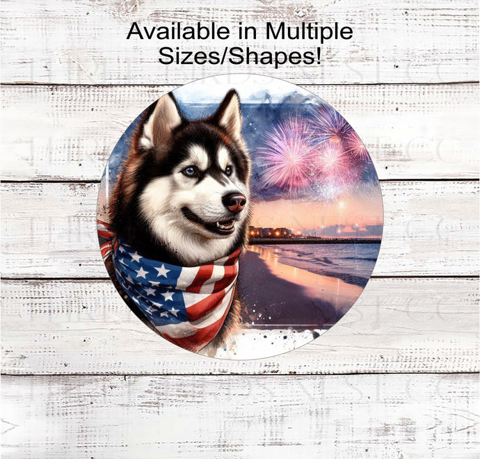 A beautiful Siberian Husky dog wearing an American Flag Bandanna on a Beach with Fireworks.