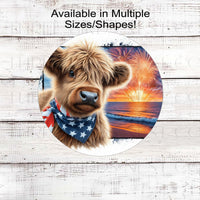 An adorable Scottish Highland Cow Calf wearing an American Flag Bandanna on a Beach with Fireworks