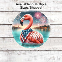 An adorable Pink Flamingo wearing an American Flag Bandanna on a Beach with Fireworks