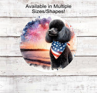 
              A beautiful black Poodle dog wearing an American Flag Bandanna on a Beach with Fireworks.
            