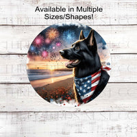 A beautiful black German Shepherd dog wearing an American Flag Bandanna on a Beach with Fireworks.