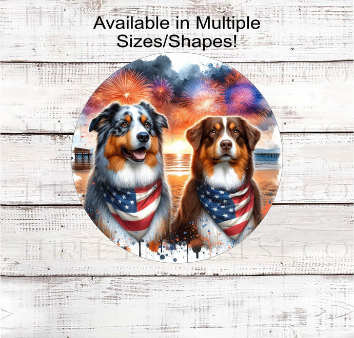 A beautiful pair of Australian Shepherd dogs wearing an American Flag Bandannsa on a Beach with Fireworks.